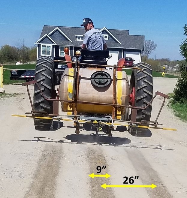 Grower on a sprayer tractor